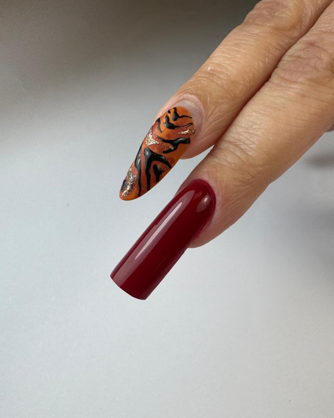 Glossy burgundy square gel nail – precision nail structure by Twinz Nails educator UK